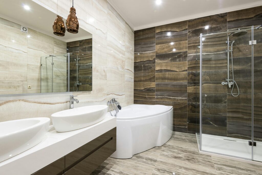 Contemporary bathroom design featuring sleek white fixtures and stylish tiles.